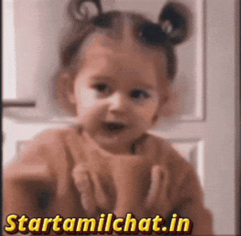 Girl Holding Cup In Front Of Startamilchat.in Sign GIF