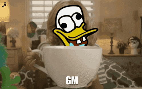 Girl Holding Cup With Duck Saying GM GIF