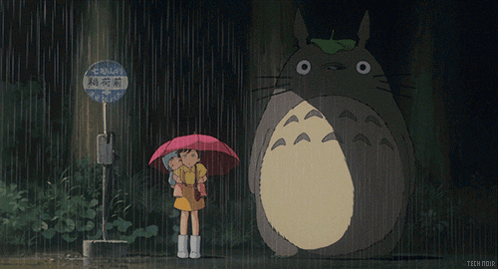 Girl Holding Umbrella Next To Totoro GIF