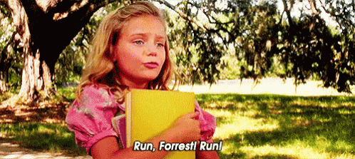 Girl Holding Yellow Book Saying Run