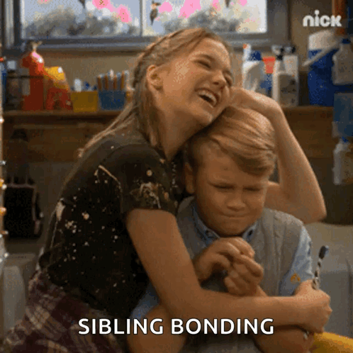 Girl Hugging Boy With Sibling Bonding