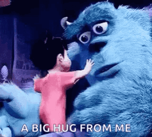 Girl Hugging Monsters Inc Stuffed Animal