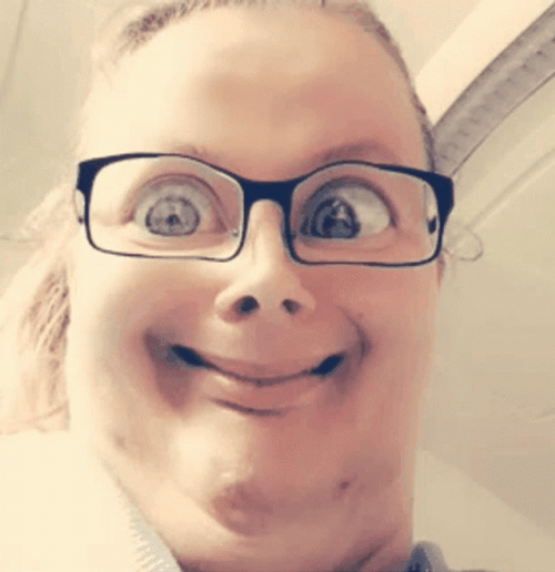 Girl In A Glasses Playing With Filters  GIF