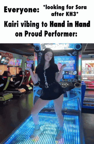 Girl In Black Dress Dancing At Arcade Machine GIF