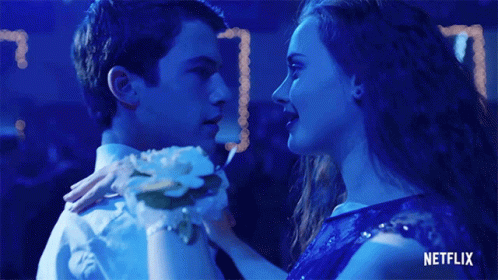 Girl In Blue Dress And Boy In White Dancing Netflix Logo GIF