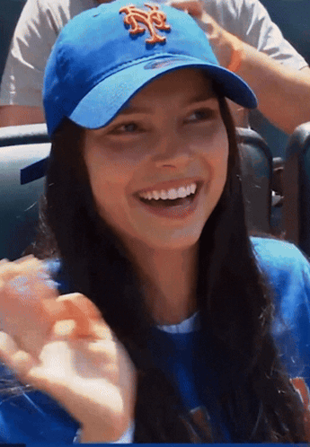 Girl In Blue Hat With NY Logo GIF