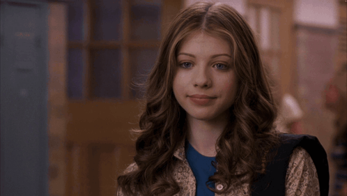 Girl In Blue Shirt With Backpack Letter M GIF