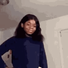 Girl in Blue Sweater Making Funny Face