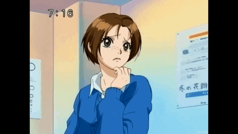 Girl In Blue Sweater Near O Sign GIF