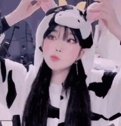 Girl In Cow Costume With Hood And Ears GIF