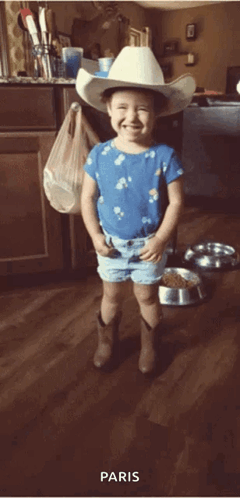 Girl in Cowboy Hat and Shorts