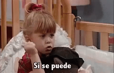 Girl in Crib Talking on Phone Si Se Puede