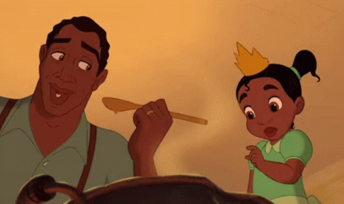 Girl In Crown Beside Man With Wooden Spoon GIF