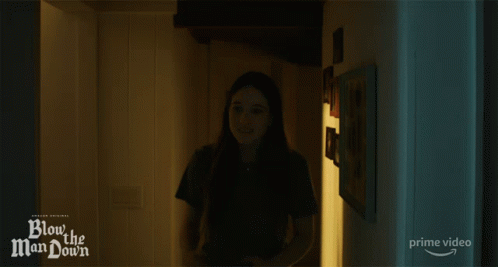 Girl in Dark Room Blow the Man Down