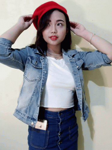 Girl in Denim Jacket and Red Hat