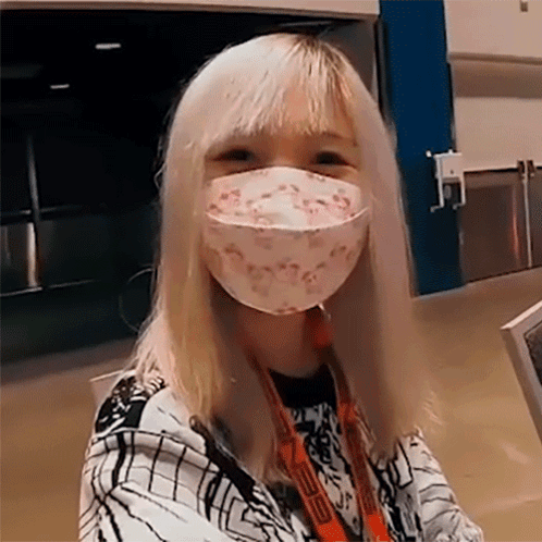 Girl in Face Mask and Lanyard