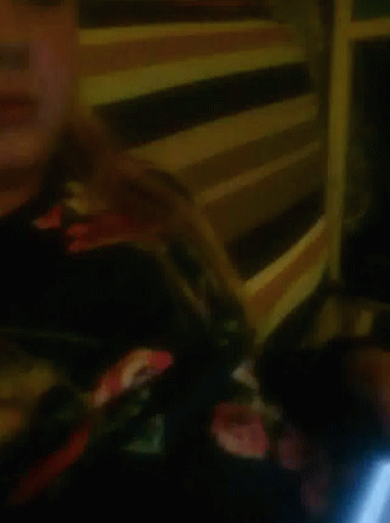 Girl in Floral Shirt