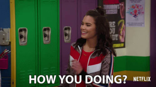 Girl in Front of Green Locker With How You Doing