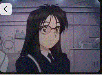 Girl in Glasses and Suit Looking at Camera