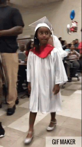 Girl in Graduation Cap and Gown