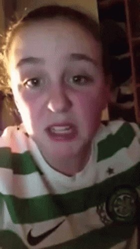 Girl in Green and White Nike Shirt