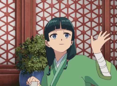 Girl in Green Kimono Holding White Cup