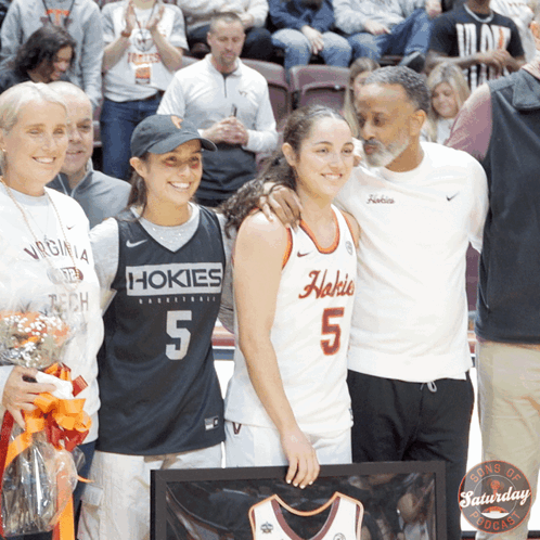 Girl in Hokies Jersey With Parents