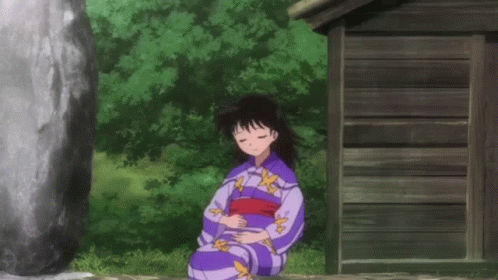 Girl in Kimono Eyes Closed Wooden Building