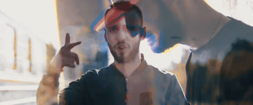 Girl In Overalls With Letter E On Shirt GIF