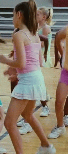 Girl In Pink Blue Dancing On Basketball Court GIF