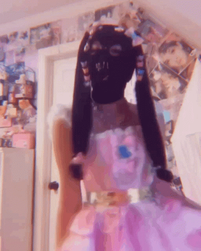 Girl in Pink Dress and Ski Mask