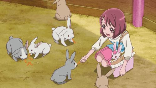 Girl In Pink Dress Feeding Rabbits GIF