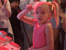 Girl In Pink Dress Holding Stick GIF