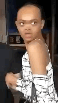 Girl In Pink Dress On Green Inner Tube In River GIF