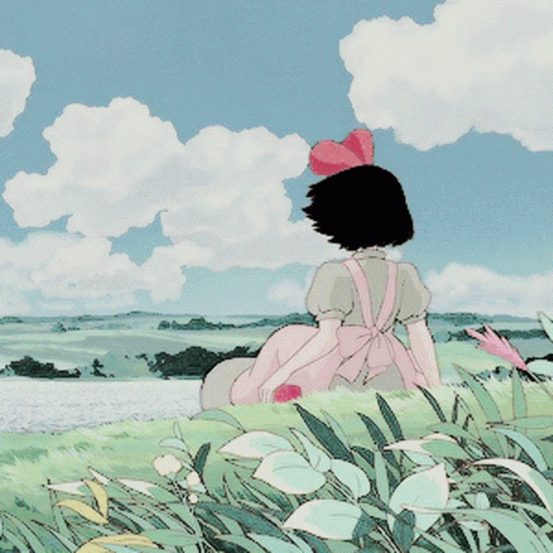 Girl in Pink Dress Sitting in Field by Water