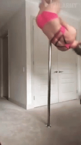 Girl In Pink Pole Dancing Fail GIF