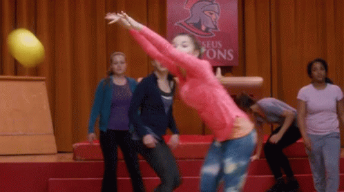Girl in Pink Shirt Throwing Ball