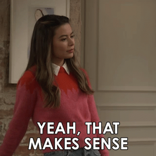 Girl in Pink Sweater Pointing Yeah That Makes Sense