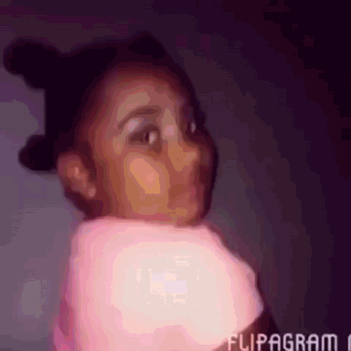 Girl in Pink Sweater with Flipagram Logo