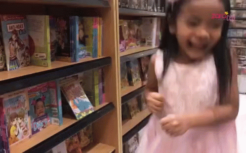 Girl In Pink Tule Jumping For Joy GIF
