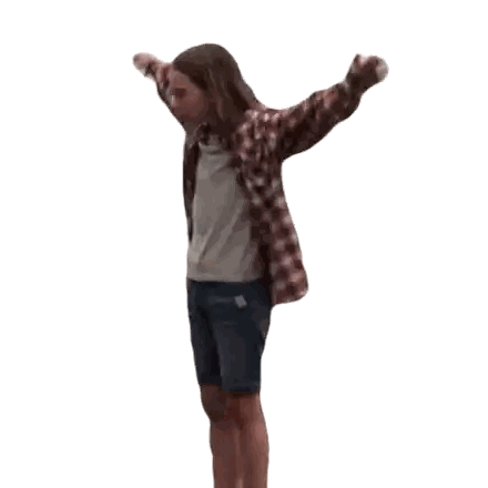 Girl in Plaid Shirt and Shorts Standing