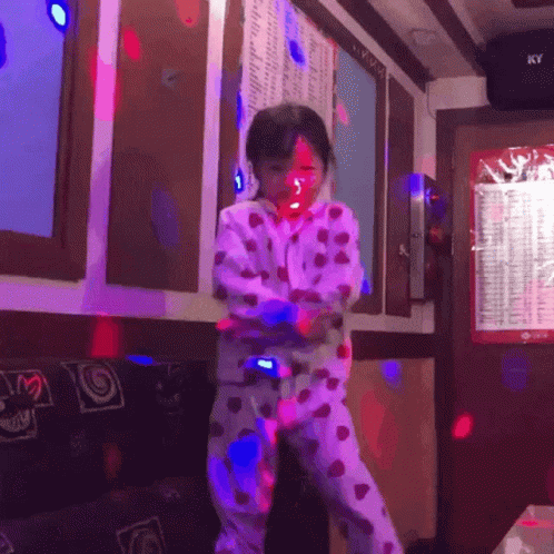 Girl In Polka Dot Pajamas Dancing GIF