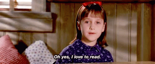 Girl in Purple Dress Reading