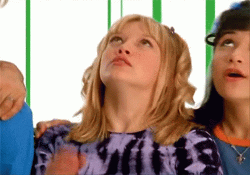 Girl in Purple Tie Dye Shirt Looking Up