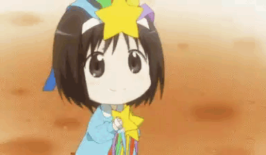 Girl In Rainbow Hat Holding Star GIF