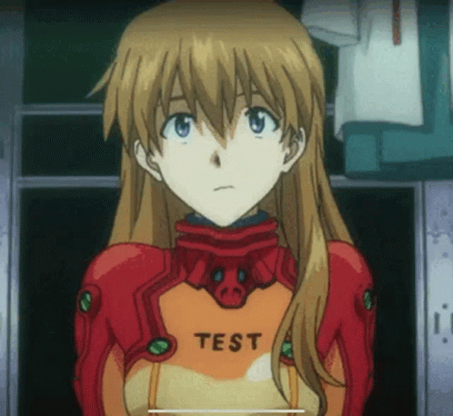Girl in Red and Orange Suit With Test on Chest