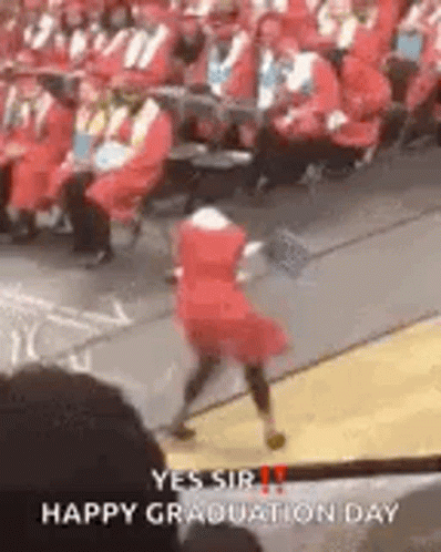 Girl In Red Dress Dancing At Graduation GIF