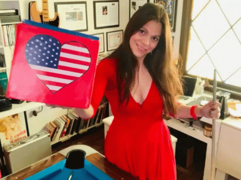 Girl In Red Dress Waving American Flag Heart GIF