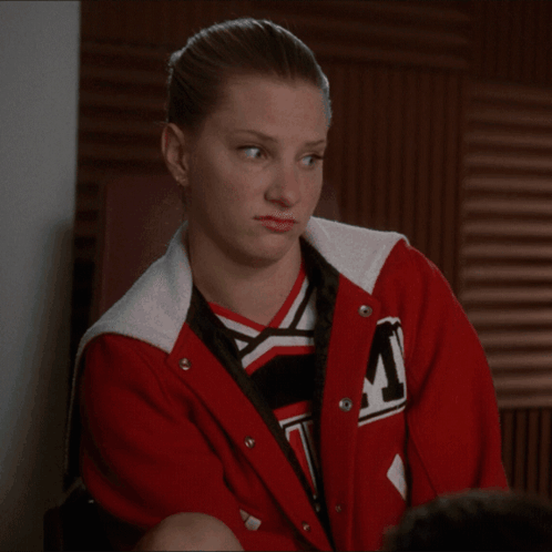 Girl in Red Jacket with Letter M