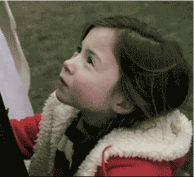 Girl in Red Jacket with White Fur Collar